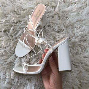 White tie-strap block heel sandals